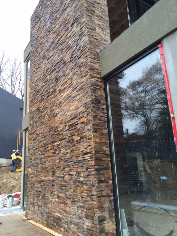 Installation of Natural Stone Erthcoverings Outback Brown Ledgestone