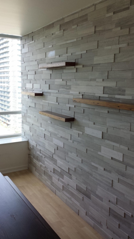 Installation of Silver Fox Erthcoverings Wall Feature